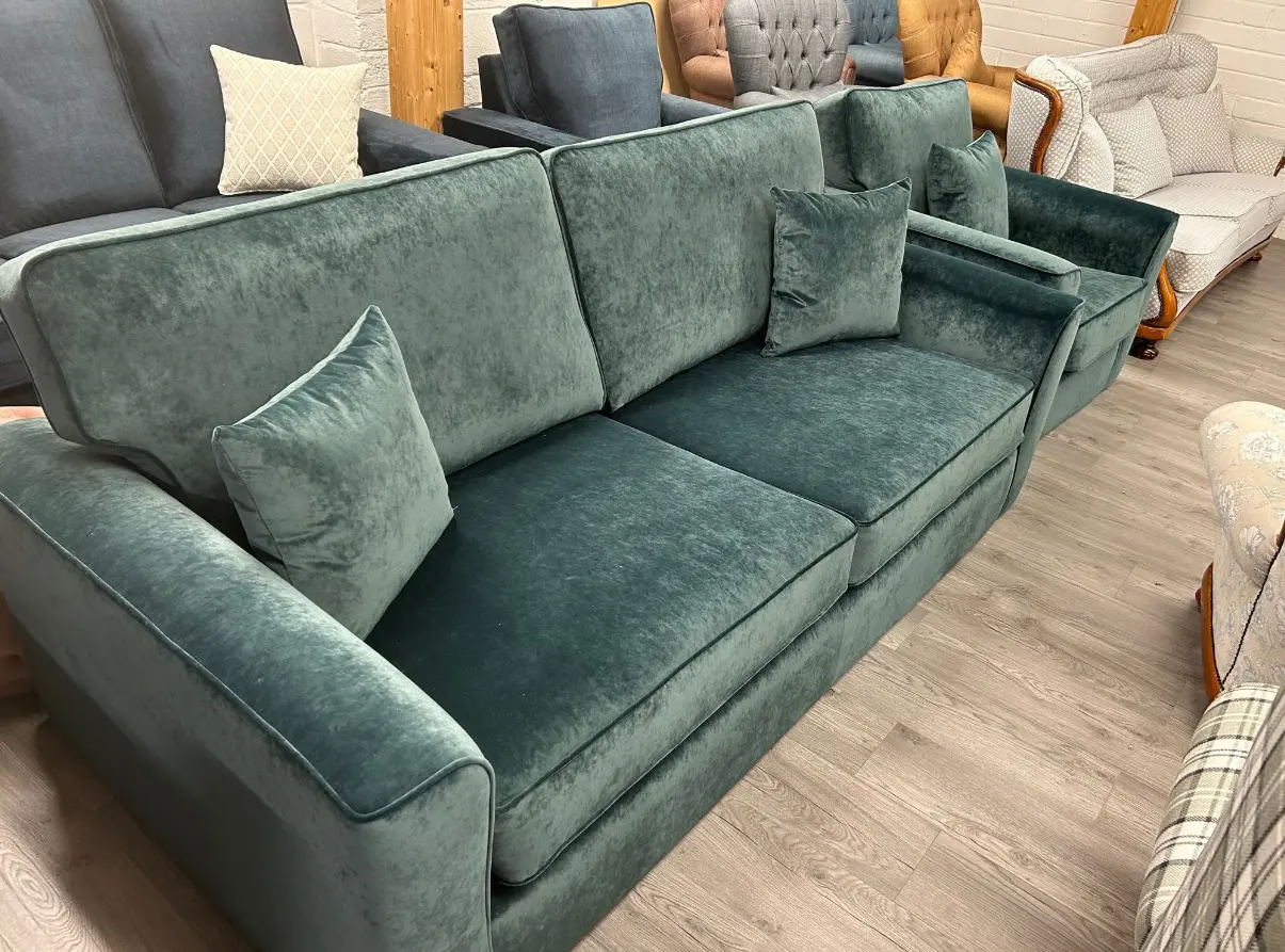 green upholstered sofa