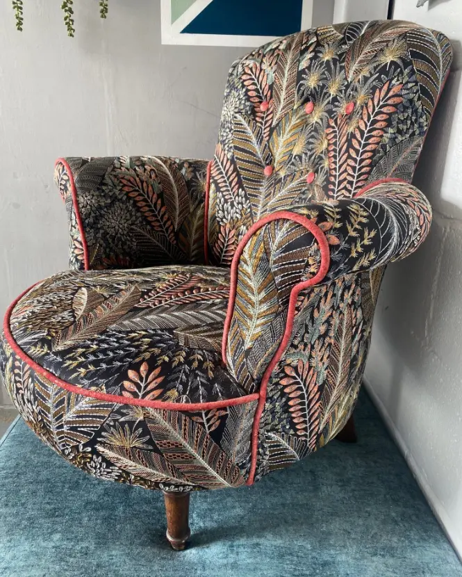 Chair upholstered with a jungle print